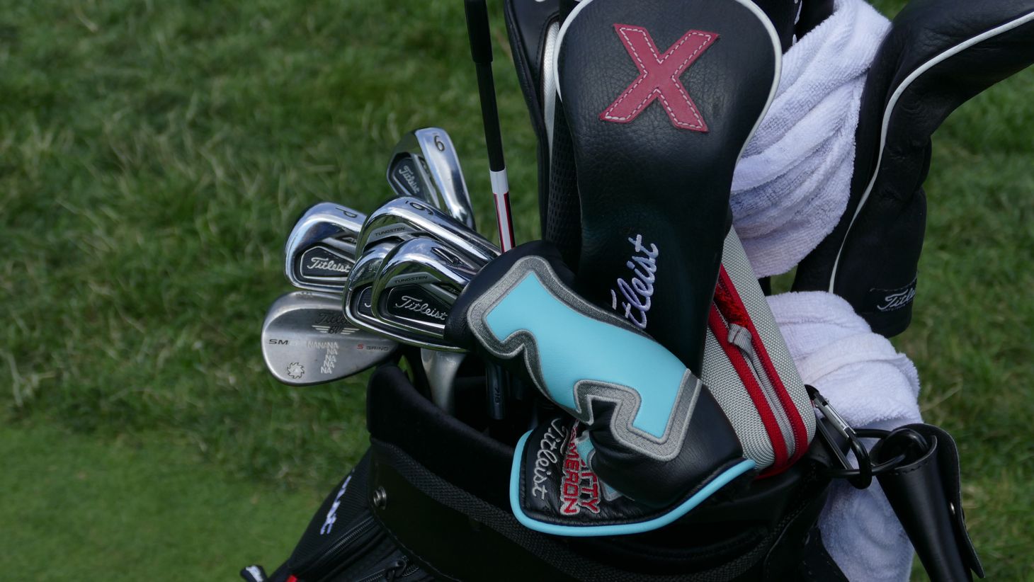 his 716 AP2 irons, along with…