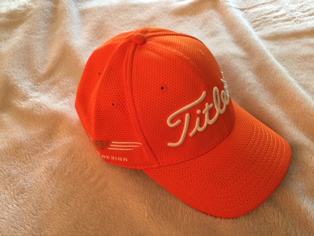 orange titleist hat