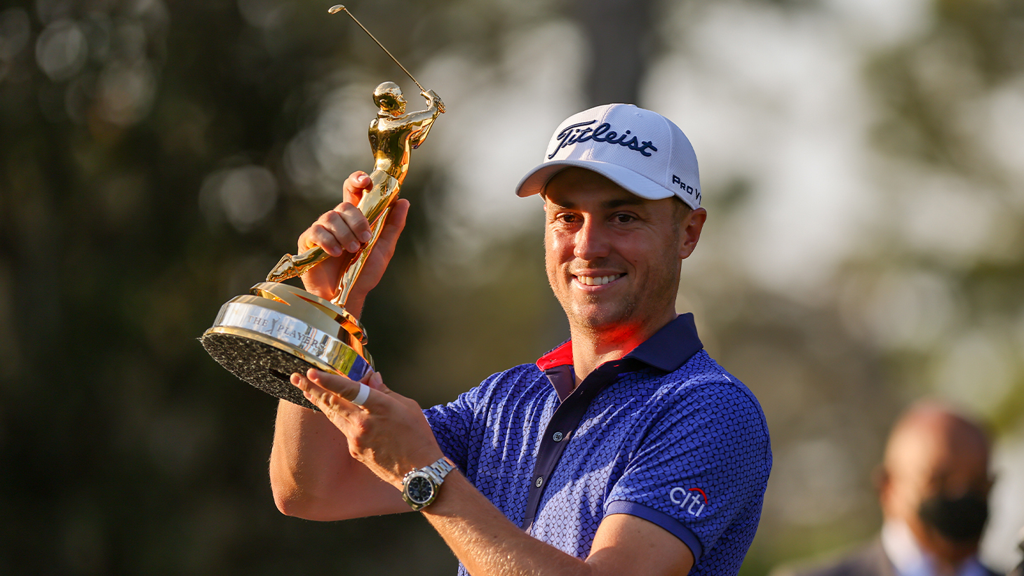 Justin Thomas (NEW Pro V1x) poses with the trophy...