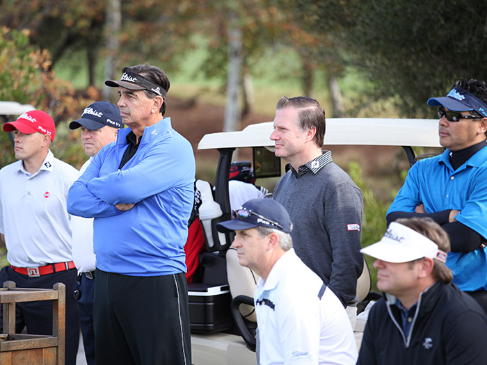 ... as fellow members looked on.