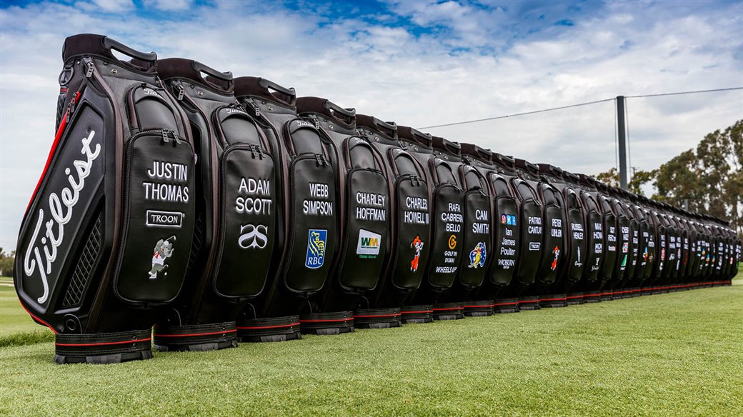 A row of new Titleist Jet Black Tour Bags await players at the Titleist Performance Institute